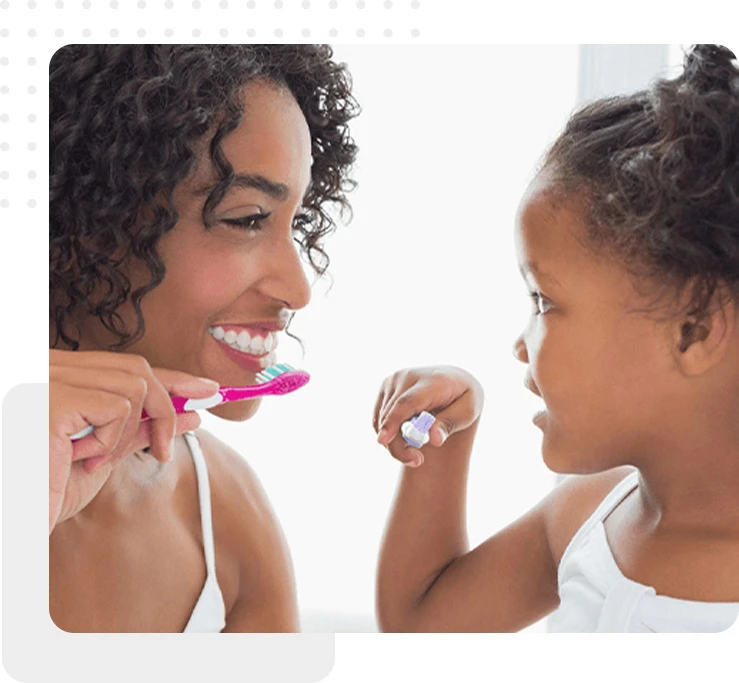 daughter and mother toothbrush