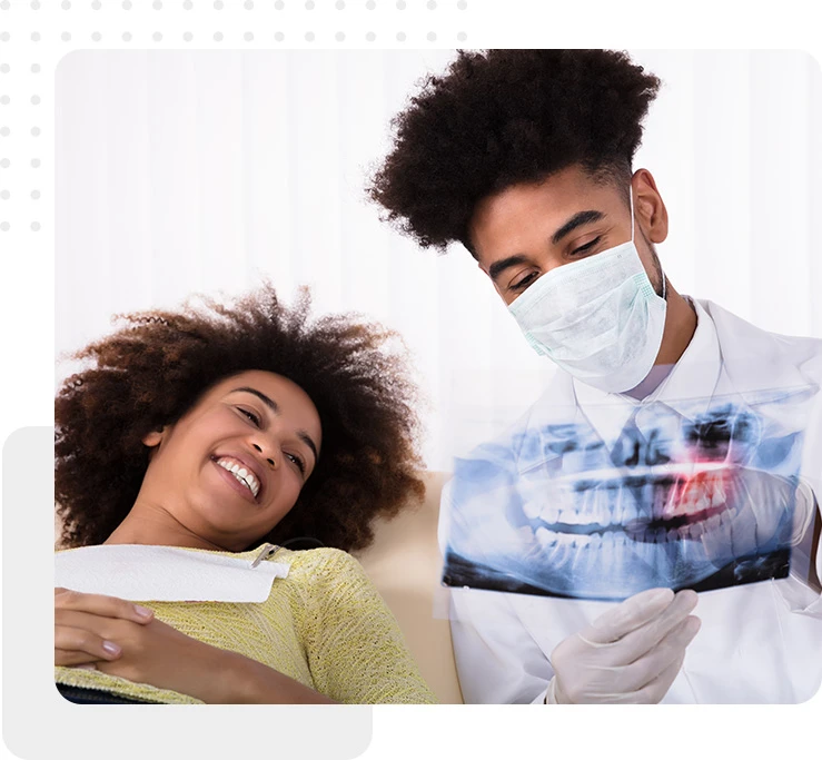 dentist and patient smiling