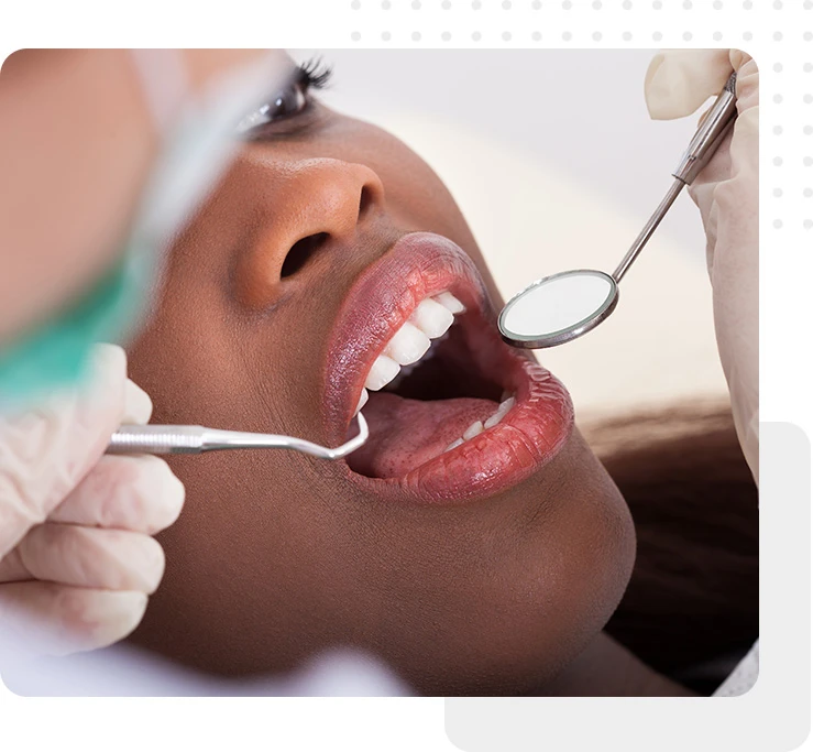 Periodontics checking teeth with female patient